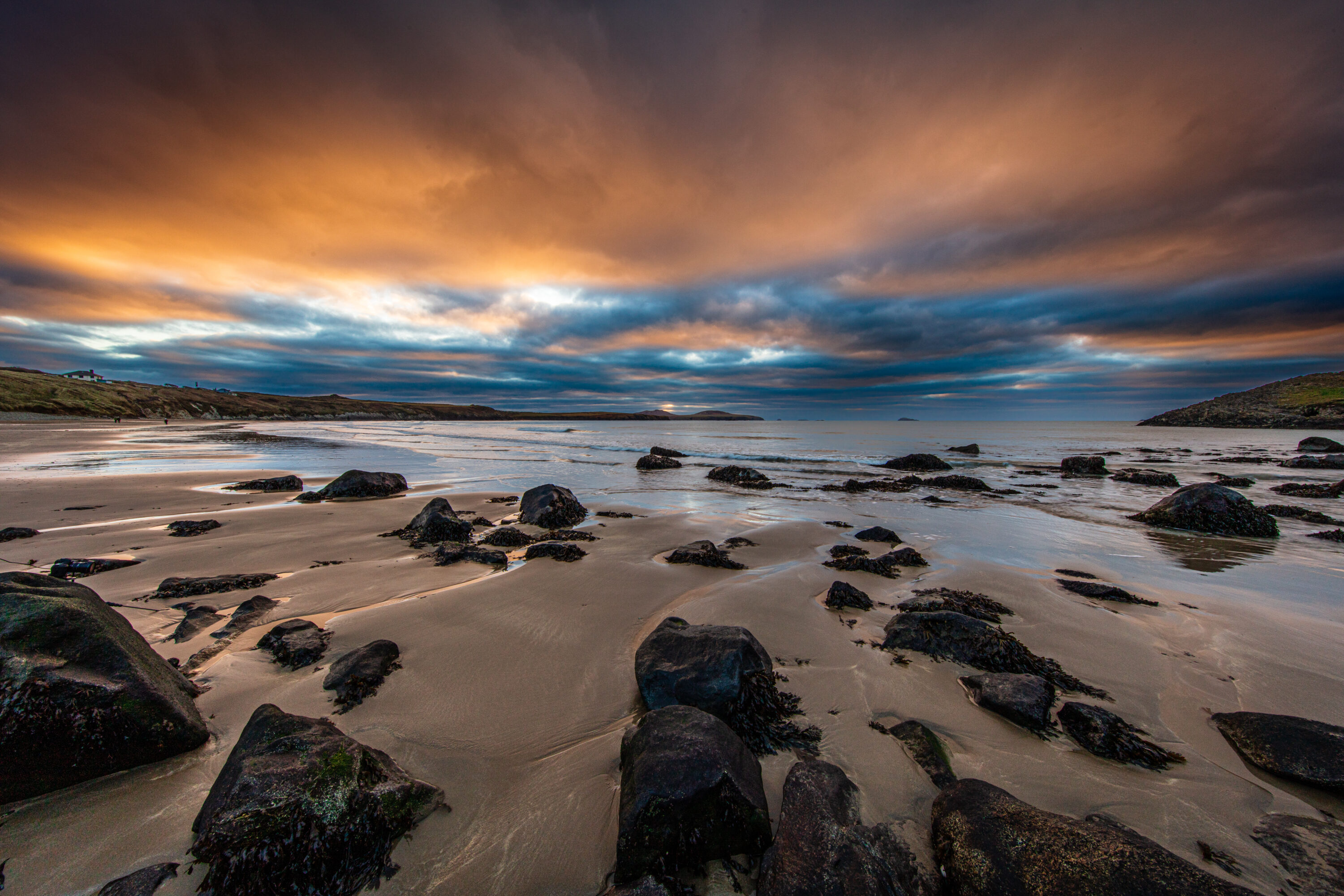 Strolling along the beach at sunset